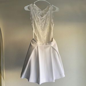 Beautiful BEBE backless dress.